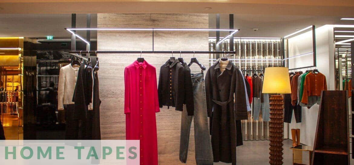 Celine store interior with clothing racks and display.
